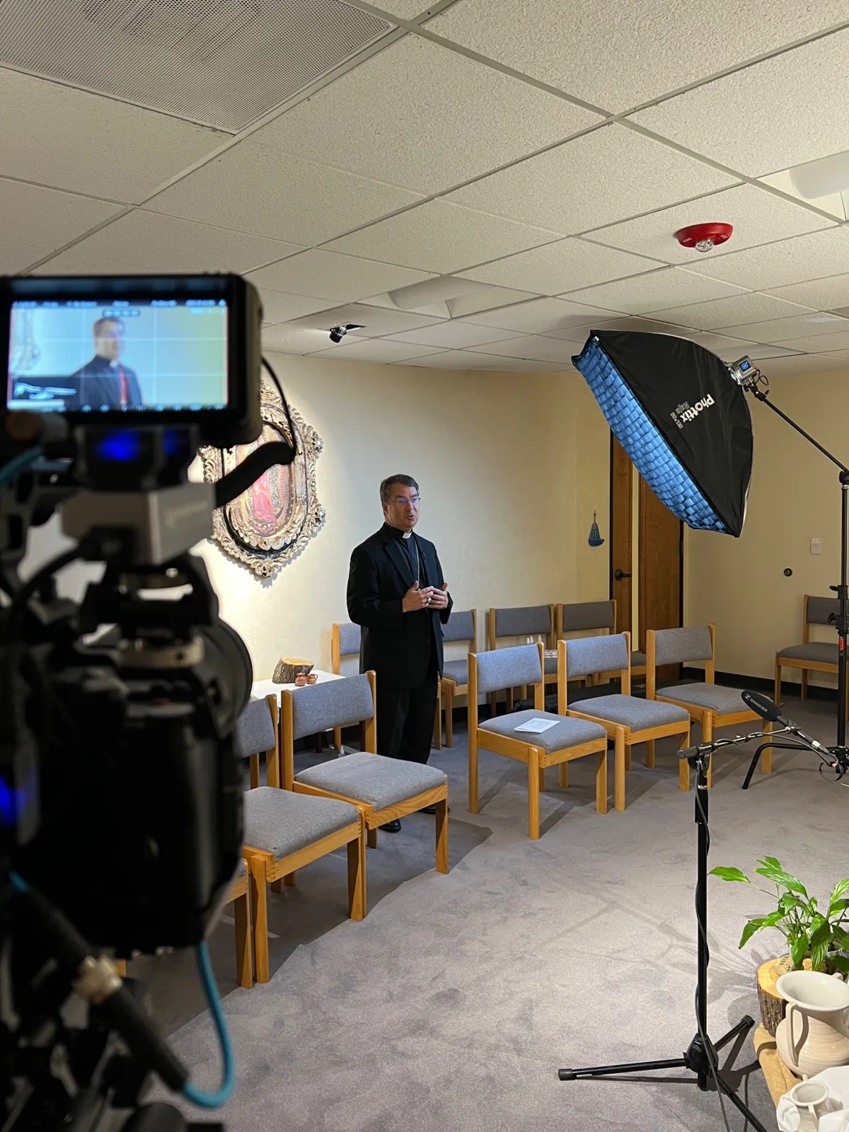 Filming an interview for the pastoral plan project